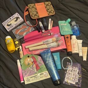 27 everything is unused, except for the Coach Wallet gently used.